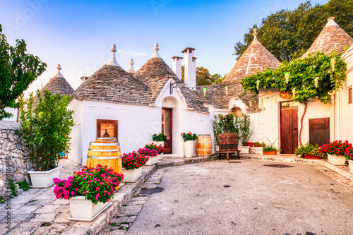 Famous Trulli Houses during a Sunny Day with Bright Blue Sky in Alberobello, Puglia