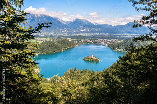 View of Lake Bled in Slovenia. In the background the high rocky corners of the Julian Alps.