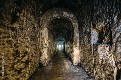 Dark creepy abandoned underground chalky cave temple