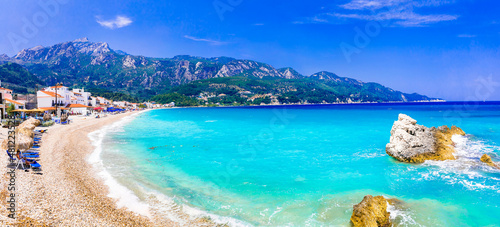 Samos island, Greece. Beautiful beach in scenic Kokkari village. popular tourist destination for summer holidays