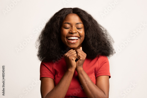 Pure Joy. Portrait Of Delighted Young Black Lady Posing Over White Background