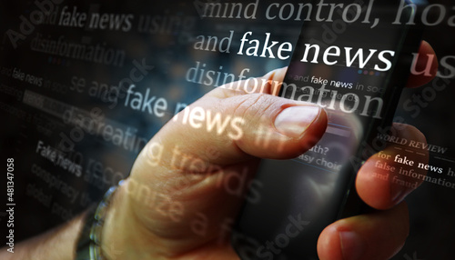 Titles on screen in hand with fake news and hoax information 3d illustration