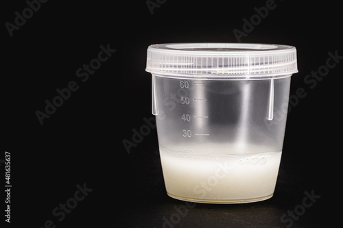 semen collection for spermogram, plastic container with male sperm