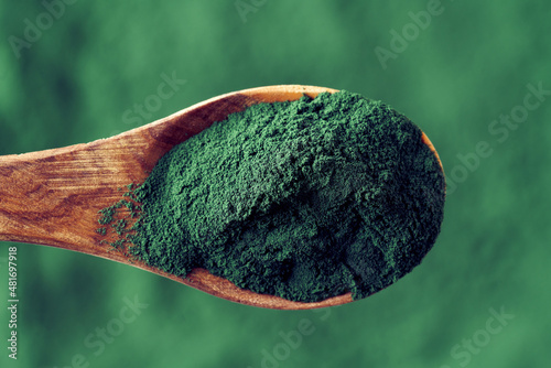 Spirulina bluegreen algae powder on a spoon