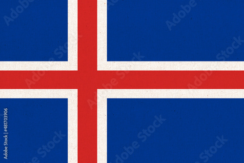 Icelandic national flag on textured background. Republic of Iceland