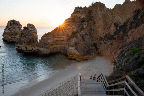 view of Camilo beach, at sunrise, in Lagos in the Algarve
