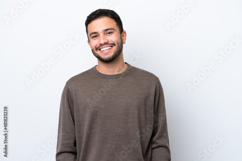 Young Brazilian man isolated on white background laughing