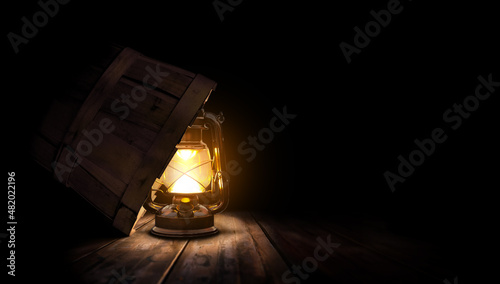 Lighted lamp under a bushel basket. Biblical parable theme concept.