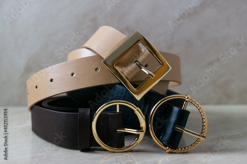 Three leather belts