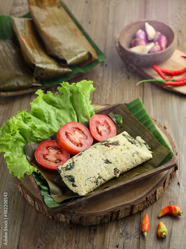 Pepes Tahu, with various spices and wrapped in banana leaves and baked. Indonesian Food.