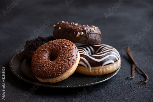Chocolate donuts and vanilla, sweet delicious baked dessert