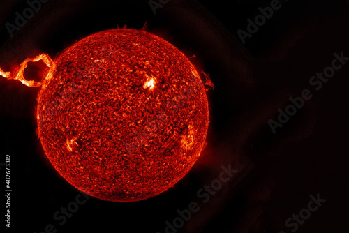 The sun from space on a dark background. Elements of this image furnished by NASA