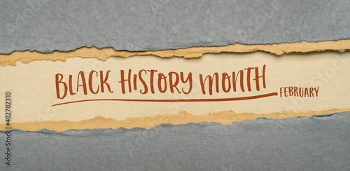 February - Black History Month banner, e handwriting on a handmade rag paper, annual observance originating in the United States, where it is also known as African-American History Month