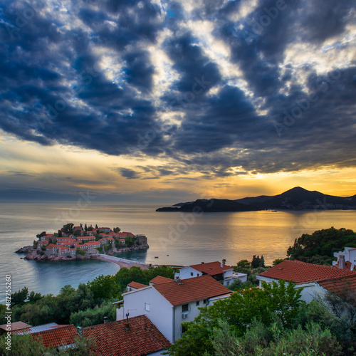 Sunset view of famous Sveti Stefan island in Montenegro