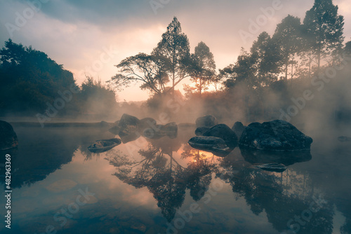 Beautiful sunrise at Chae Son Hot Springs over the misty morning is a famous place and destination at Lampang, Thailand.