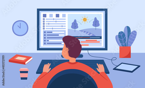 Male animator sitting at computer desk and creating project. Graphic motion designer sitting at workplace in studio and developing web game flat vector illustration. Design, art concept