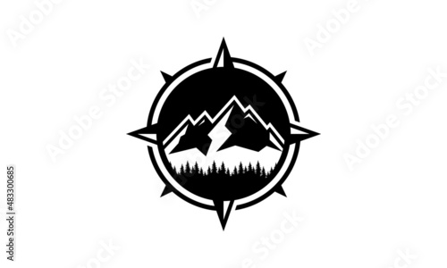 compass mountain adventure logo and pine forest design