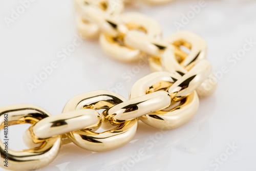 Gold jewelry. Gold chain isolated