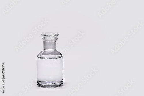 Reagent bottle with stopper Glass, isolated on white background