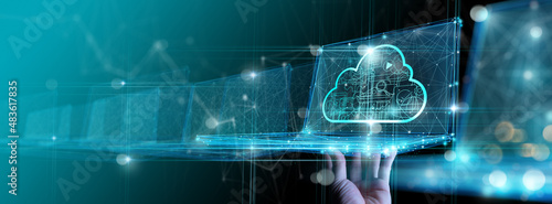 Hand showing laptop computer with cloud network Computer connects to internet server service for cloud data transfer.Cloud computing technology and online data storage for business network concept.