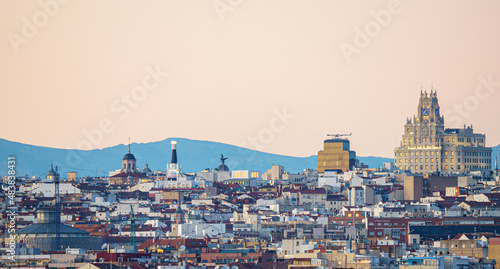 Panoramic view of the city of Madrid during a sunset, roofs and skyline