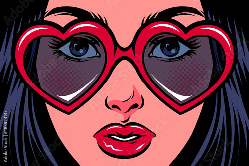Young woman with heart-shaped glasses. Pop art comic vector illustration.
