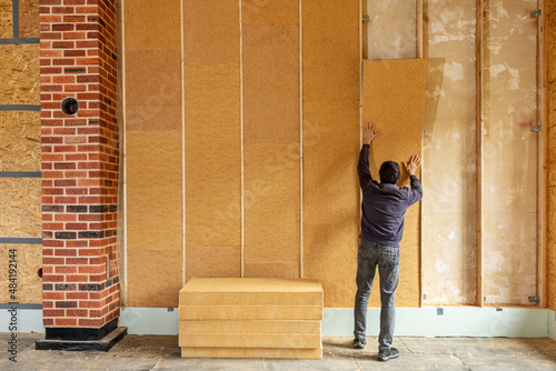 Installing thermal insulation inside a building, wood fiber boards 