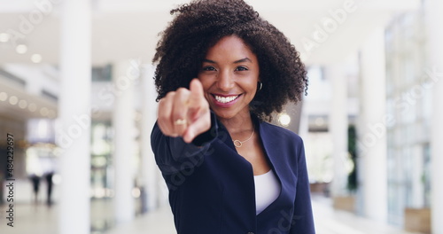 I want you on my team. 4k video footage of a happy young businesswoman pointing at you in a modern office.