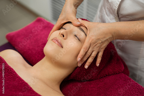 Face massage at the reception in the beauty salon 
