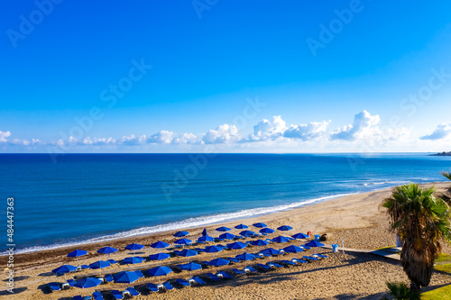 Aerial view of amazing beach with umbrellas, Crete island, Greece.