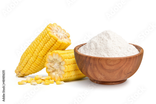 Corn starch in wooden bowl with fresh corn isolated on white background.