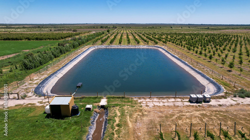 Aerial view of a water tank (pool) for irrigation in agriculture.