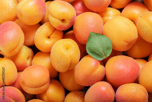 fresh ripe apricots as background