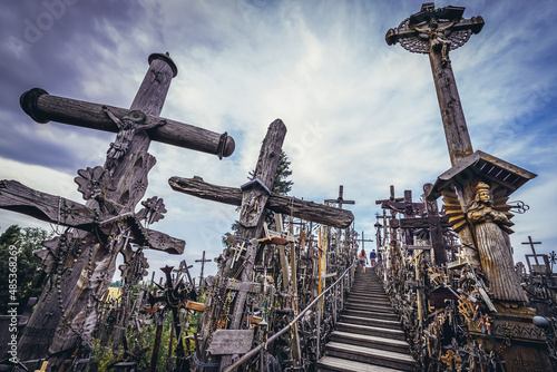 Wooden path among crosses in famous pilgrimage site near Siauliai city called Hill of Crosses, Lithuania