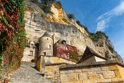 Limestone cliff and historic houses of La Roque-Gageac, Perigord