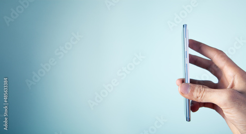 hand holds phone, advertising space