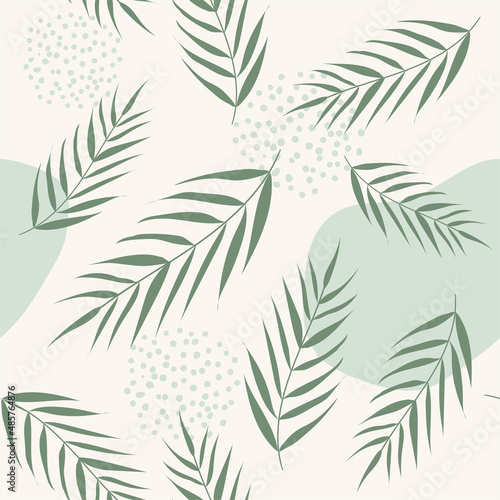 Vector seamless pattern with palm leaves. Abstract floral summer green background for print design, wallpaper
