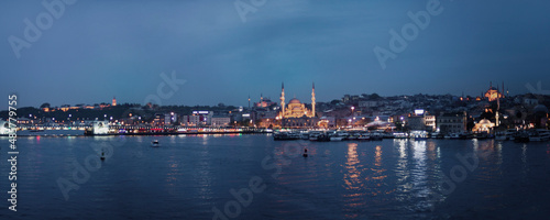 New Mosque (Yeni Cami) at night seen across Golden Horn, Istanbul, Turkey, Eastern Europe