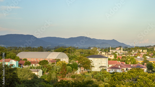 View over Camobi, Santa Maria, RS, Brazil. Mountains and a blue sky in a sunny afternoon in southern Brazil. Town in Brazil in the middle of the atlantic forest.