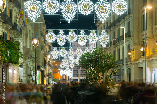 Night view of Barcelona streets in winter on celebration Christmas and New Year