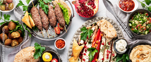 Lebanese food assortment on light background.