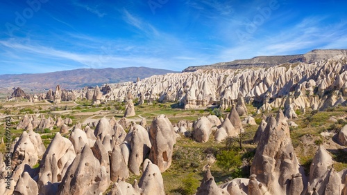 Cappadocia near Goreme with spectacular pillars and minaret-like forms. Cappadocia is very popular tourist destination in Turkey.
