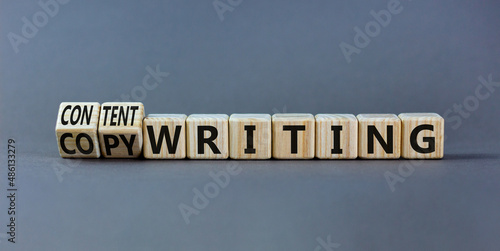 Content writing or copywriting symbol. Turned cubes and changed concept words content writing to copywriting. Beautiful grey background copy space. Business Content writing or copywriting concept.