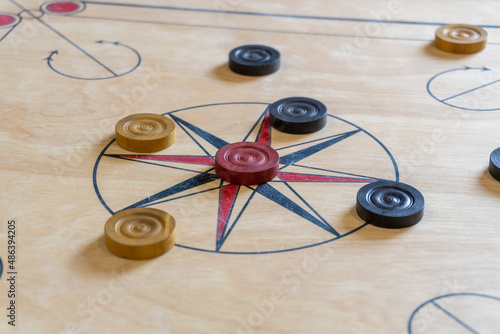 Carrom is a tabletop game of South Asian origin. Carrom is very commonly played by families, including children, and at social functions.