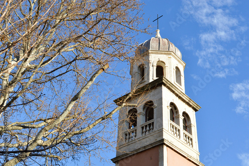 Zadar, Croatia: Beautiful bell tower from Church of Our Lady of Health and bare branches of platanus tree, London plane tree during winter
