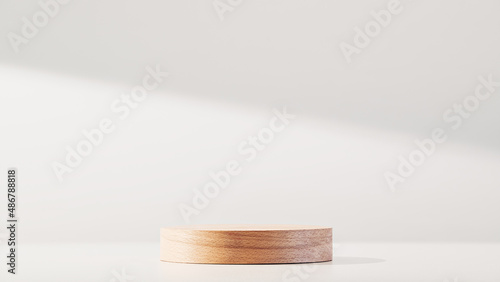 Round wooden podium on a white background