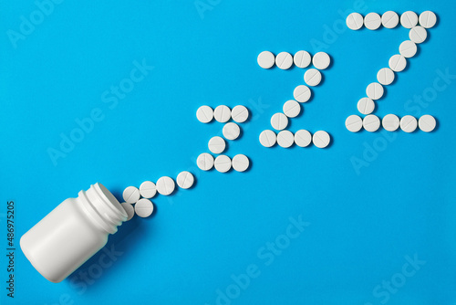 insomnia concept. sleeping pills in the form of z-z-z are scattered from a die 