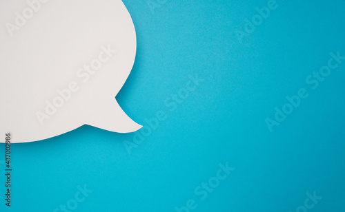 Blank white speech bubble part on a blue background