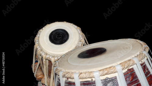 Tabla, Table musical instrument, traditional Indian drum set isolated on black background with copy space.