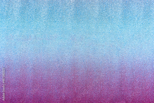 Metallic crepe paper texture colored in pink to blue neon gradient